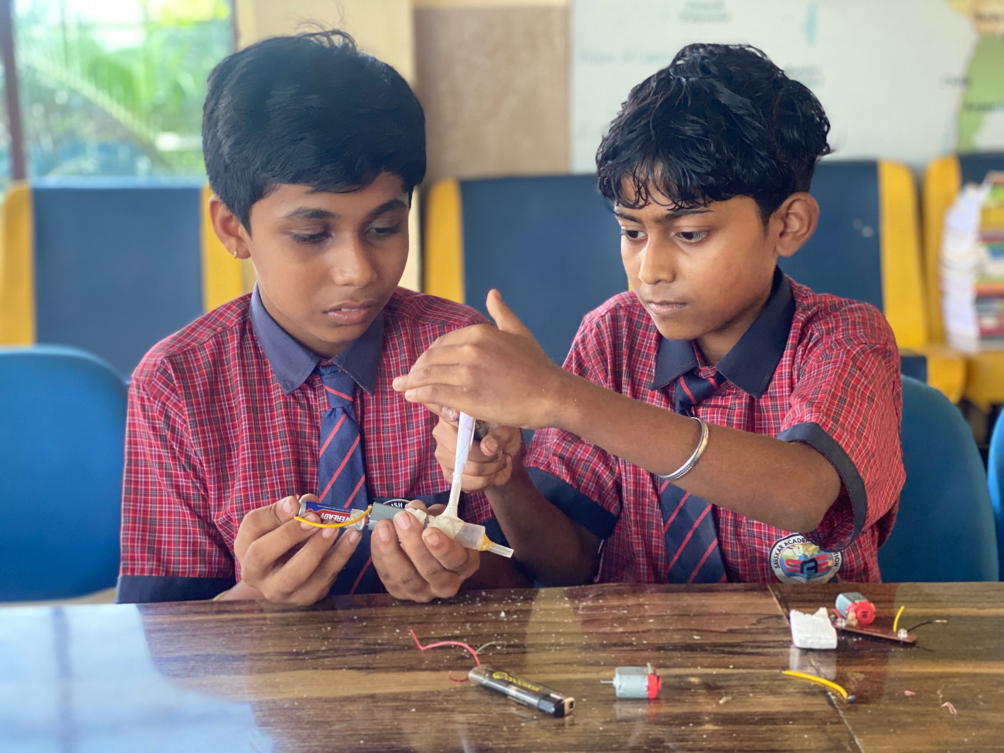 Sanskar Academy students learning through a practical project