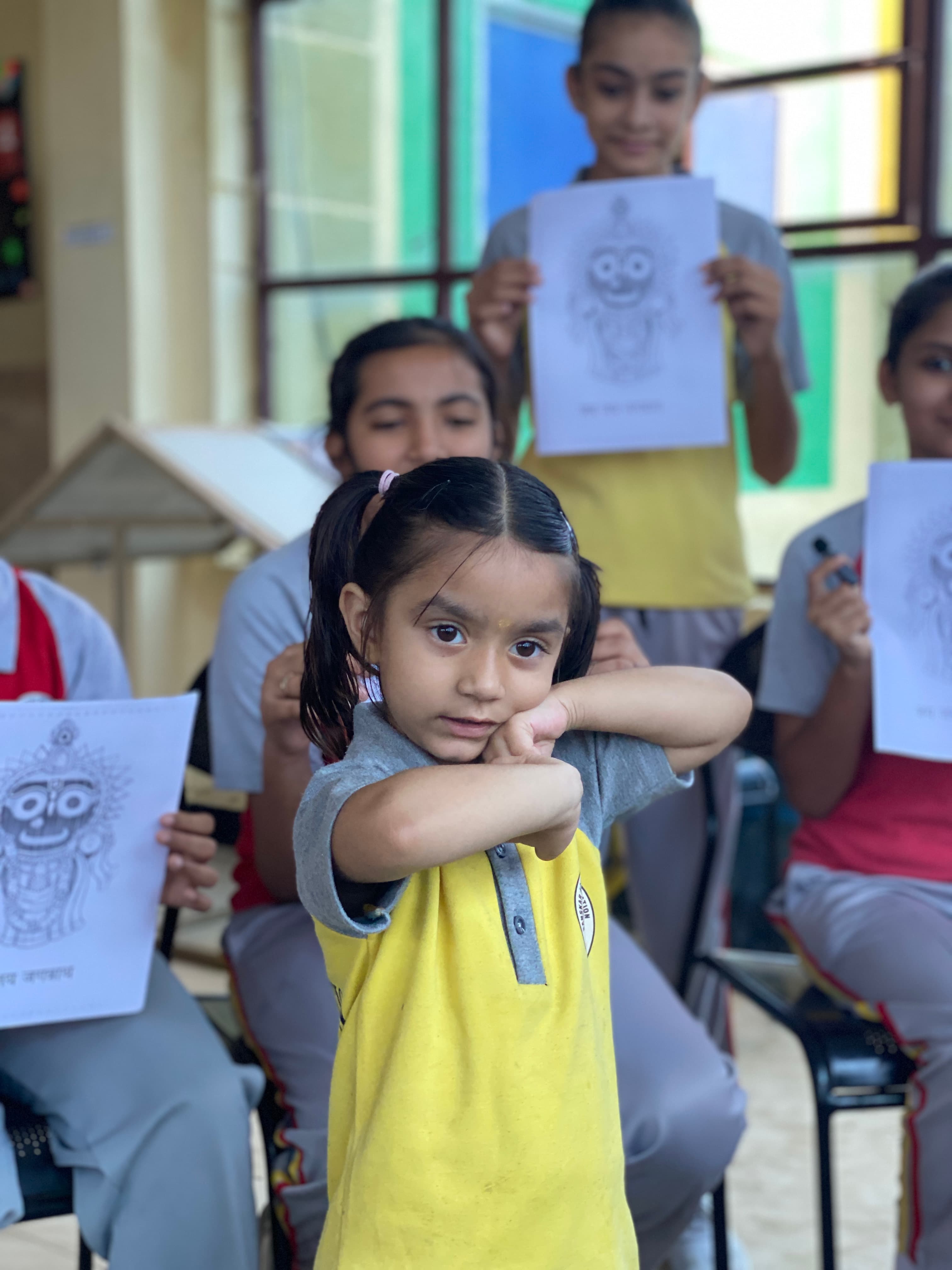 Young Sanskar Academy students enjoying a creative activity
